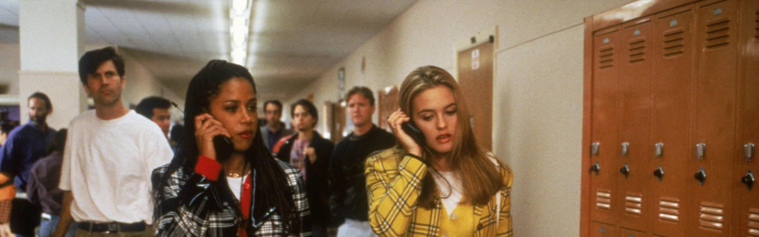 cher and dionne in plaid outfits in a still from clueless