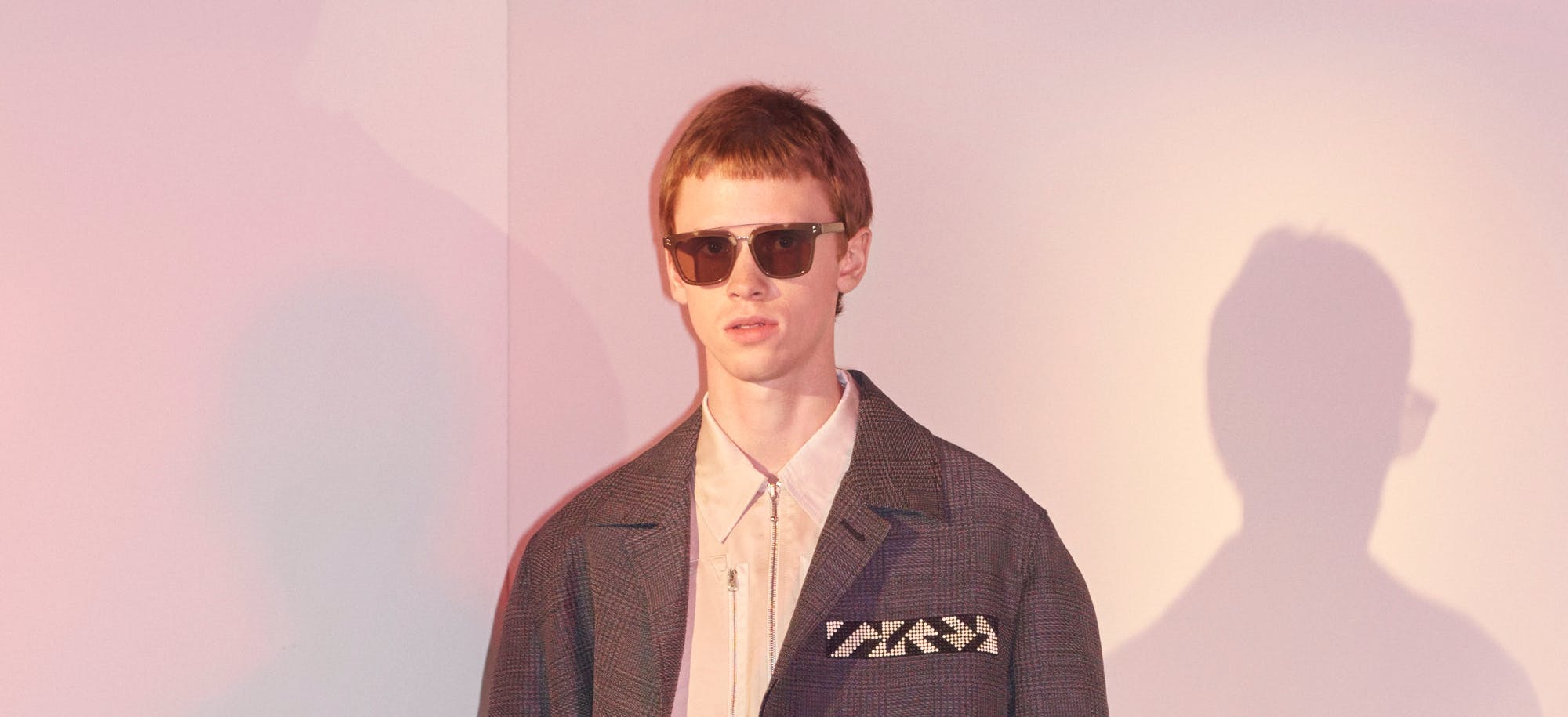 sunglasses accessories person suit coat overcoat clothing man jacket blazer