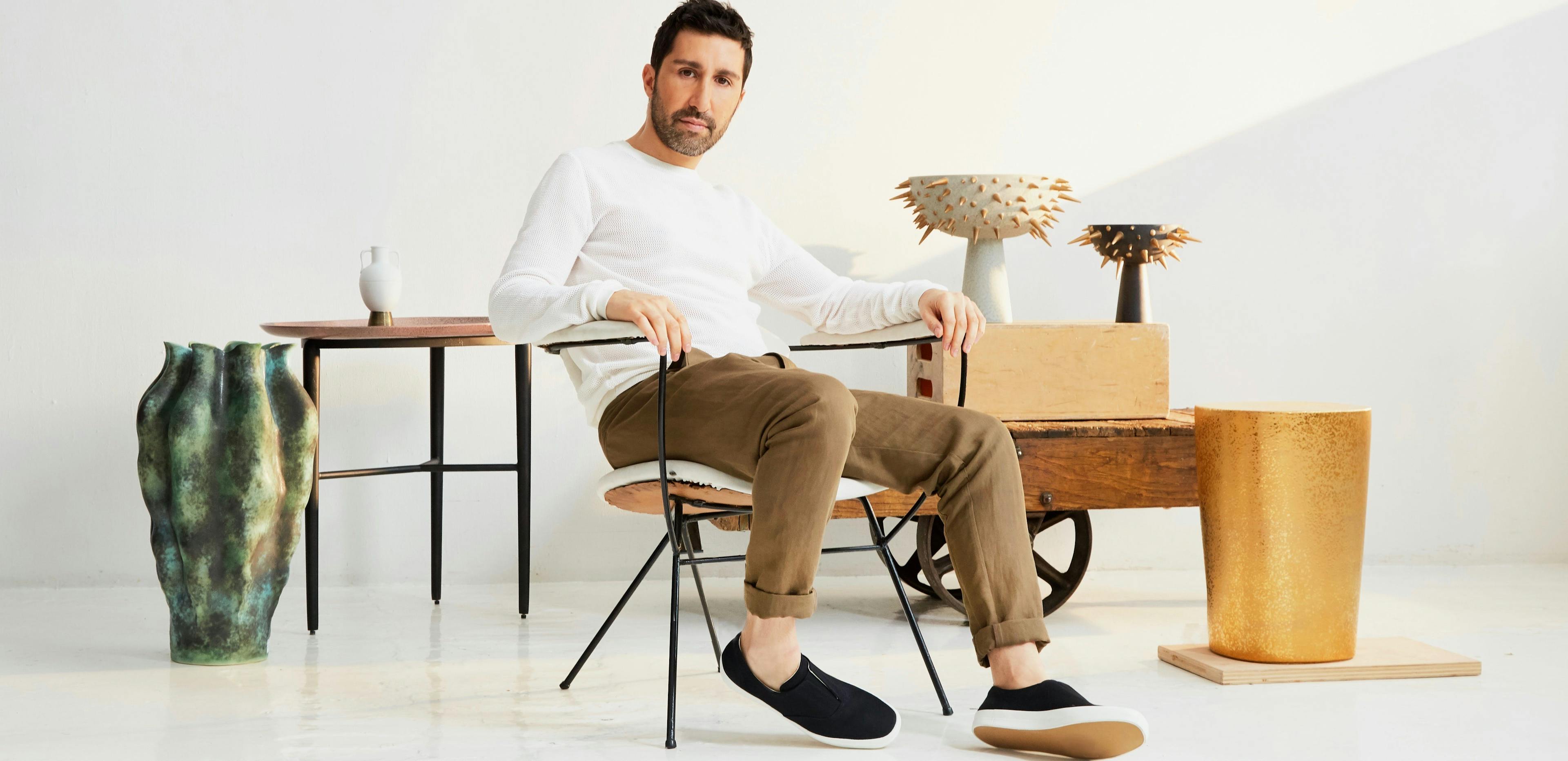sitting person human clothing apparel furniture wood footwear