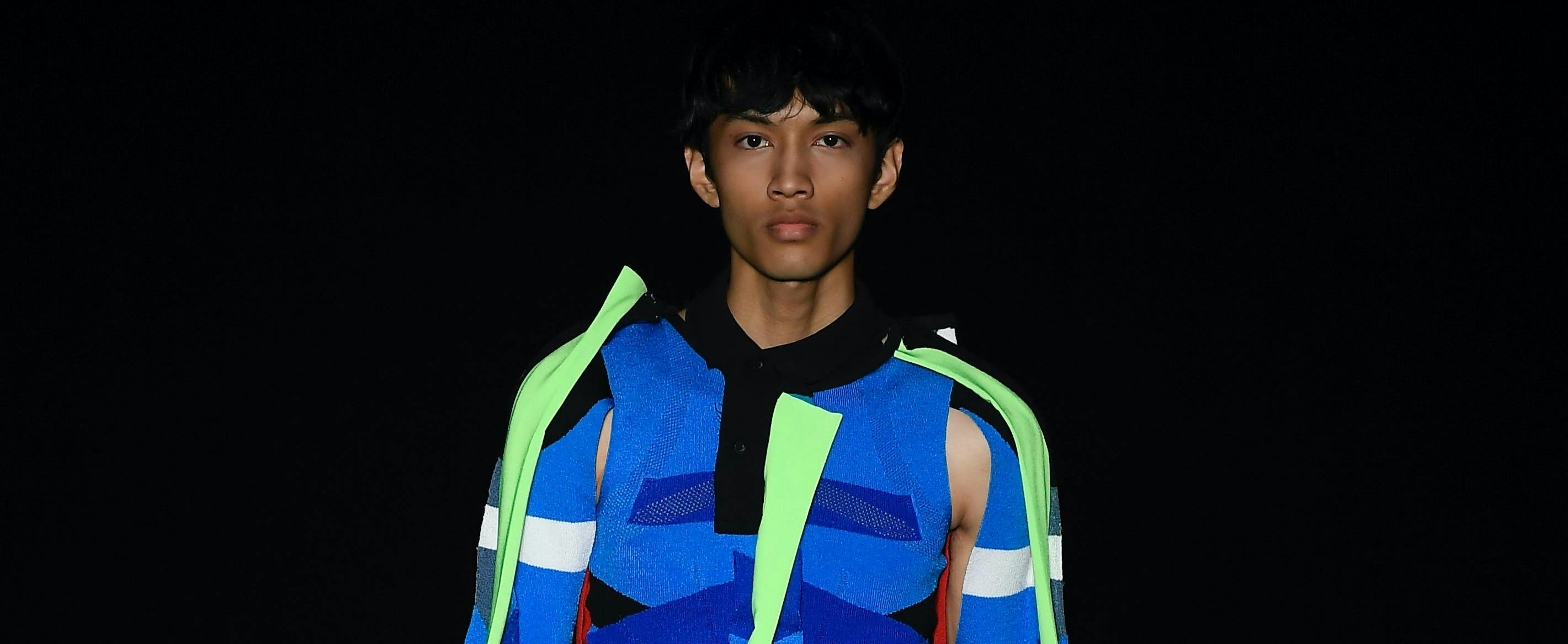 clothing apparel person human vest sleeve lifejacket