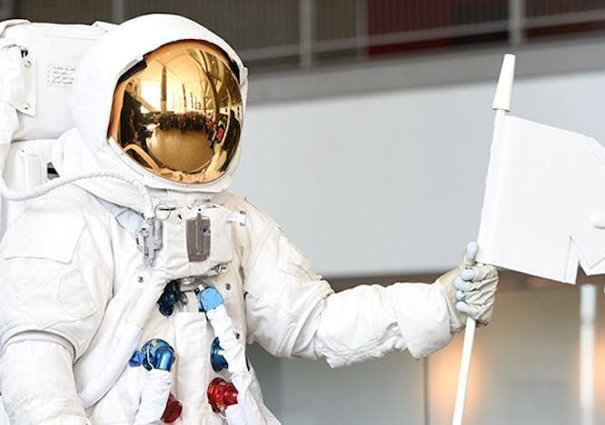 person human helmet clothing apparel astronaut