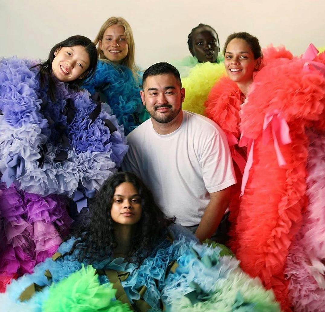 clothing apparel person human scarf feather boa face people