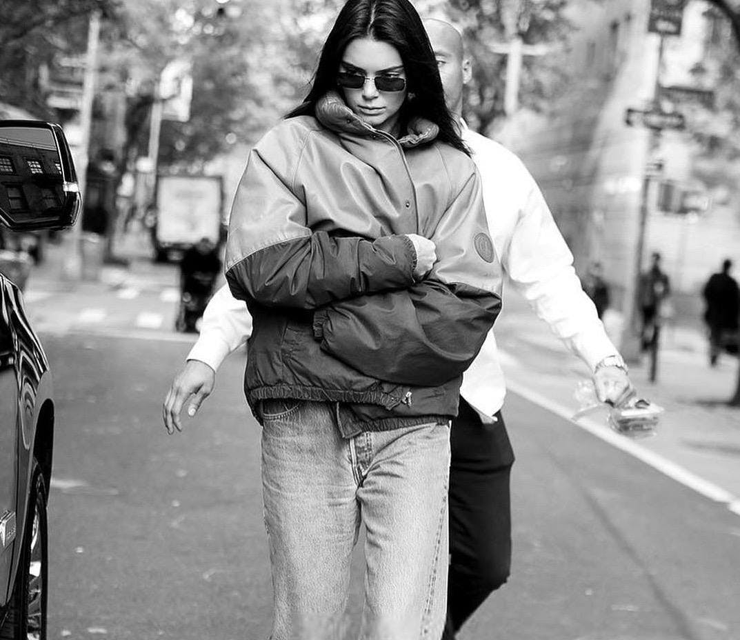 clothing sunglasses accessories person jacket coat car transportation vehicle pedestrian
