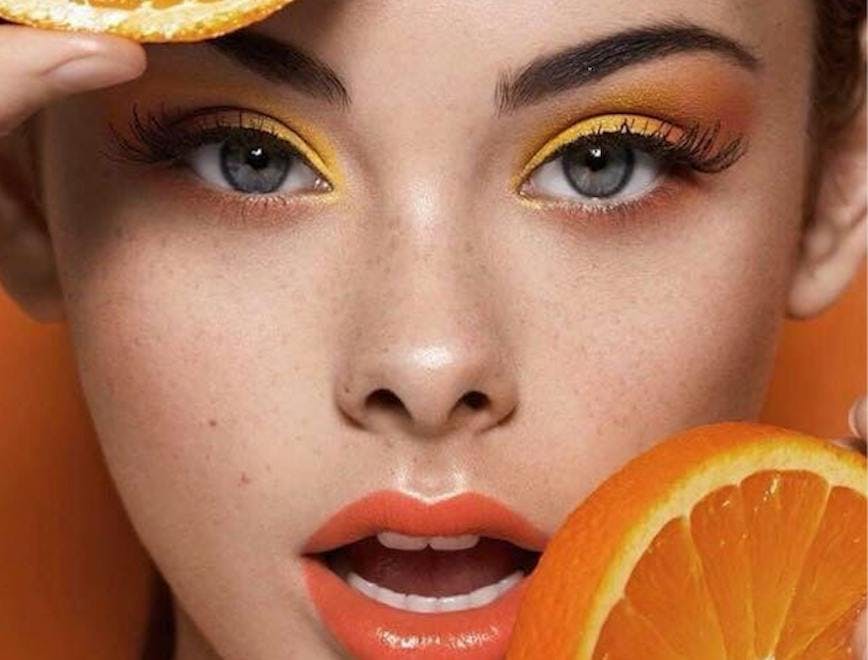 citrus fruit plant fruit food orange person face grapefruit produce peel