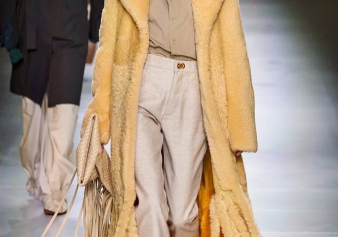 coat clothing apparel person human sunglasses accessories accessory overcoat fashion