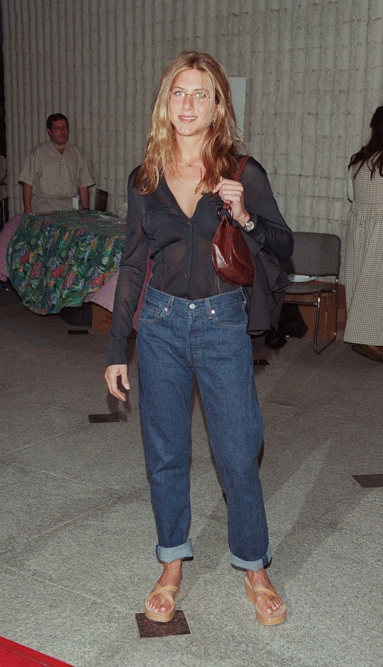The actress wears an easygoing denim and button-down look.