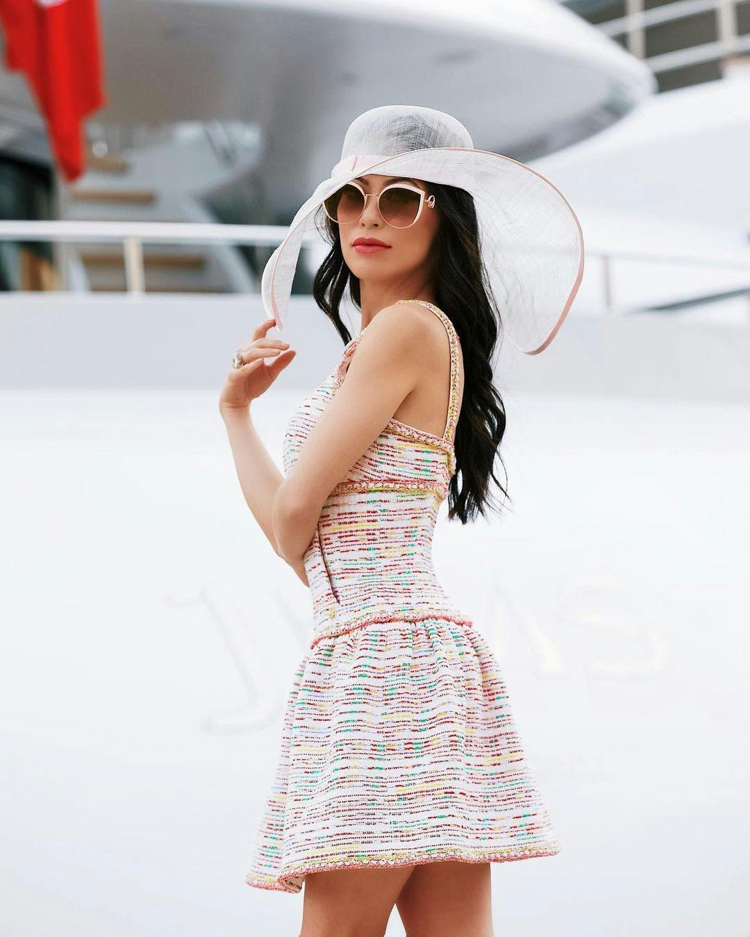 clothing sunglasses accessories person sun hat hat evening dress fashion gown robe