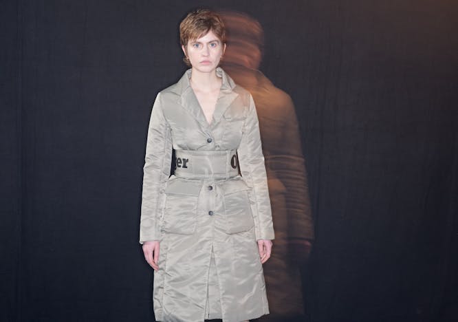 sleeve clothing apparel long sleeve person human runway overcoat coat