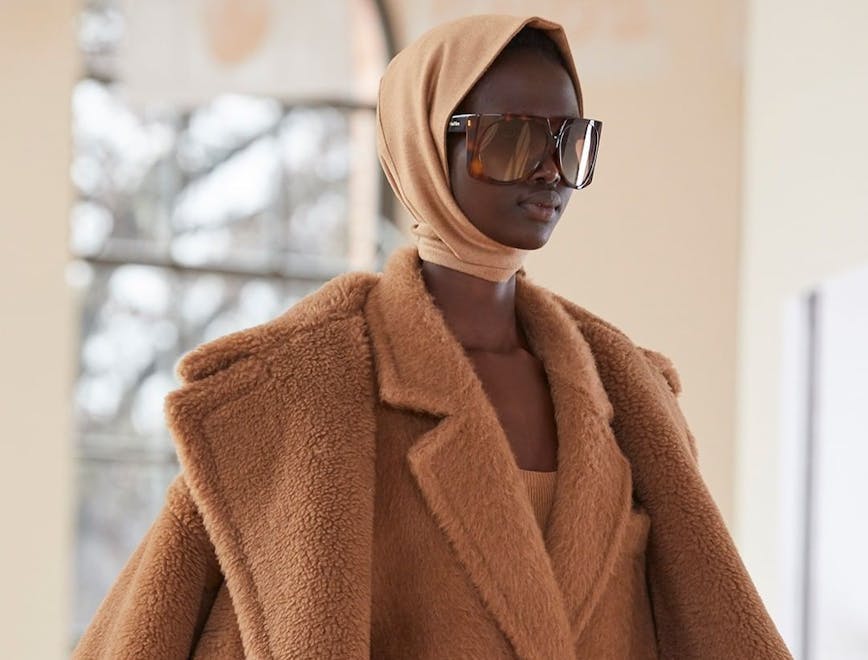 clothing apparel coat overcoat sunglasses accessories accessory person human jacket