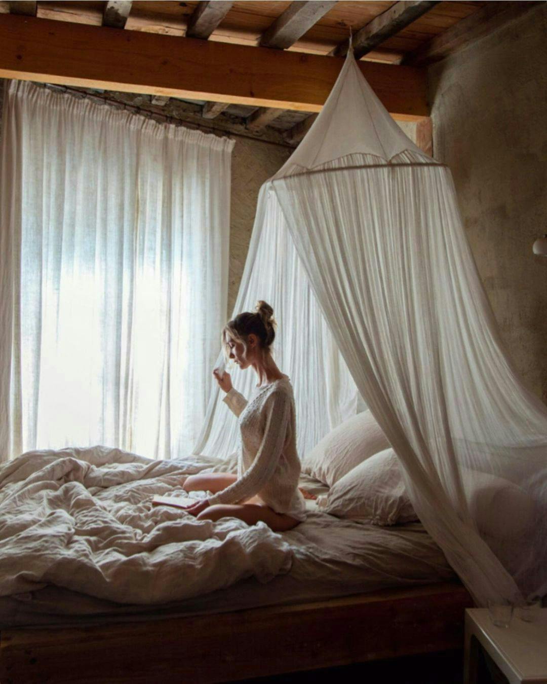 person human bed furniture mosquito net