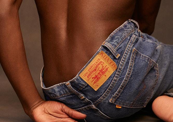 pants clothing apparel person human back jeans denim