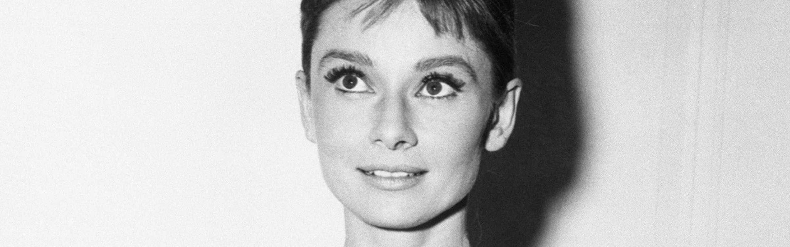Audrey Hepburn poses in iconic Givenchy black dress from "Breakfast at TIffany's"