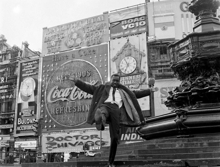 Radio host and BBC Africa service presenter Mike Eghan in Piccadilly Circus, London, 1967. Courtesy of Galerie Clémentine de la Féronnière.