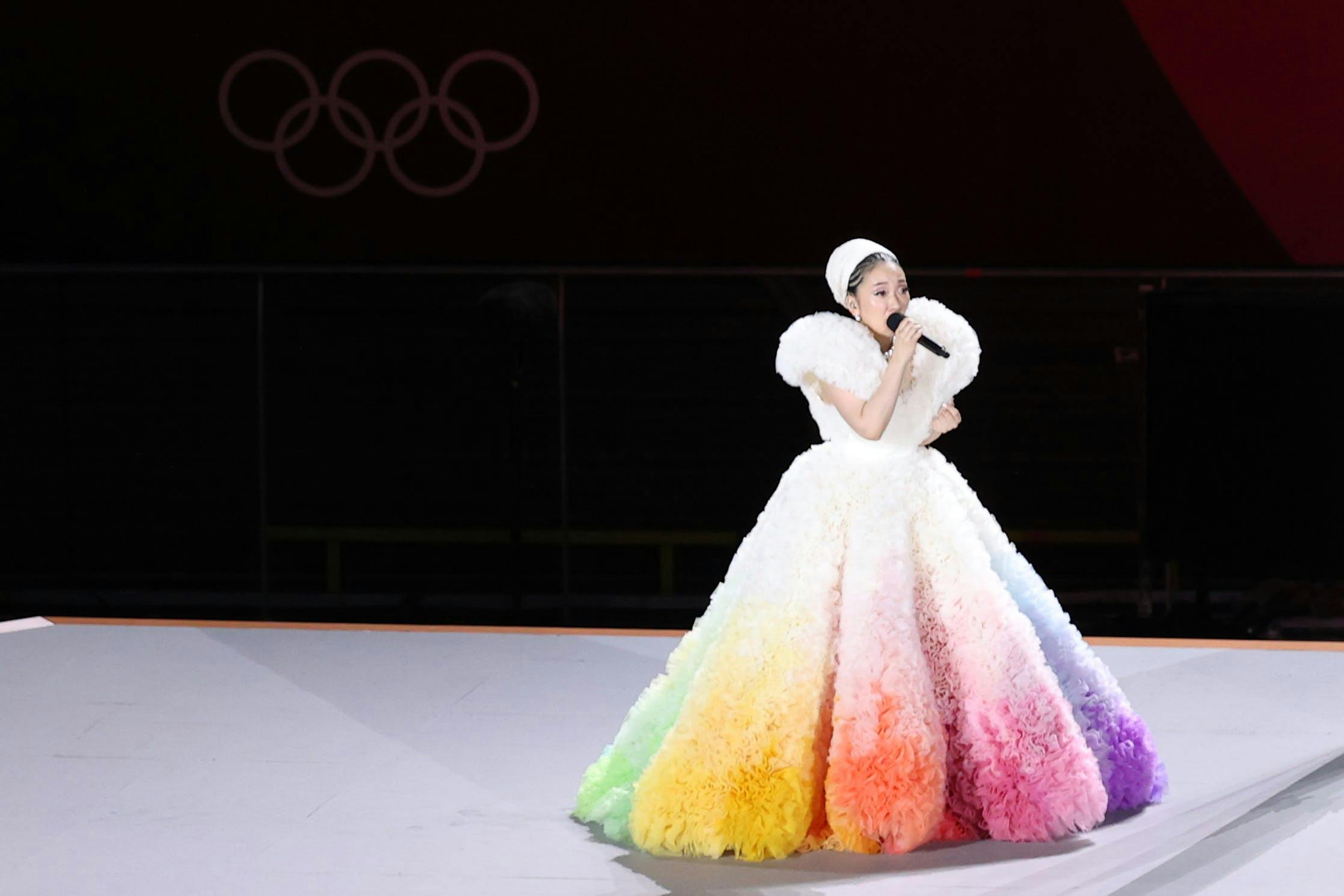 tokyo 2020 summer olympics torch relay olympic games clothing apparel evening dress gown fashion robe female person human
