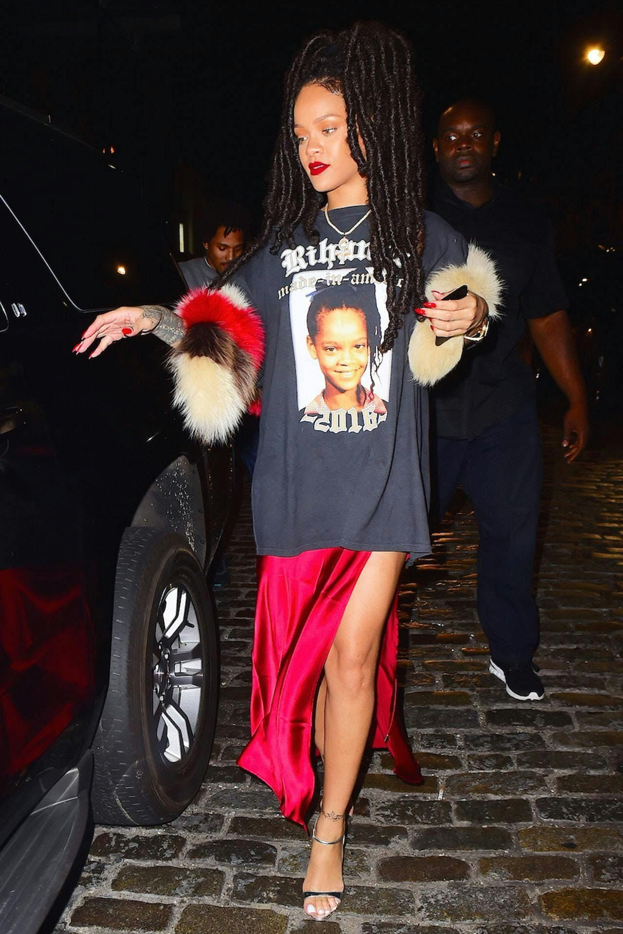 Rihanna sports a tee of herself.