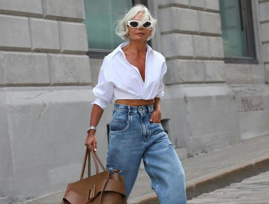 jeans denim clothing pants apparel person human sunglasses accessories accessory