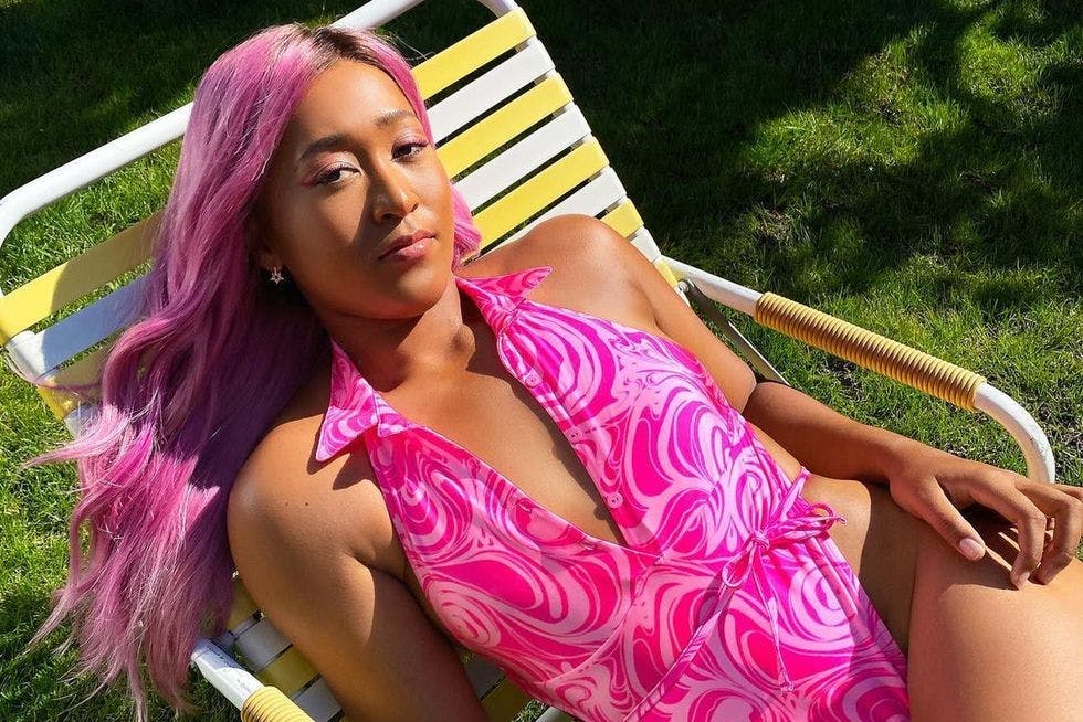Naomi Osaka pink hair pink bathing suit lawn chair grass