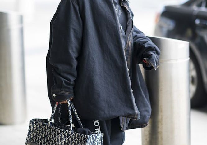 sunglasses accessories accessory person human handbag bag clothing apparel