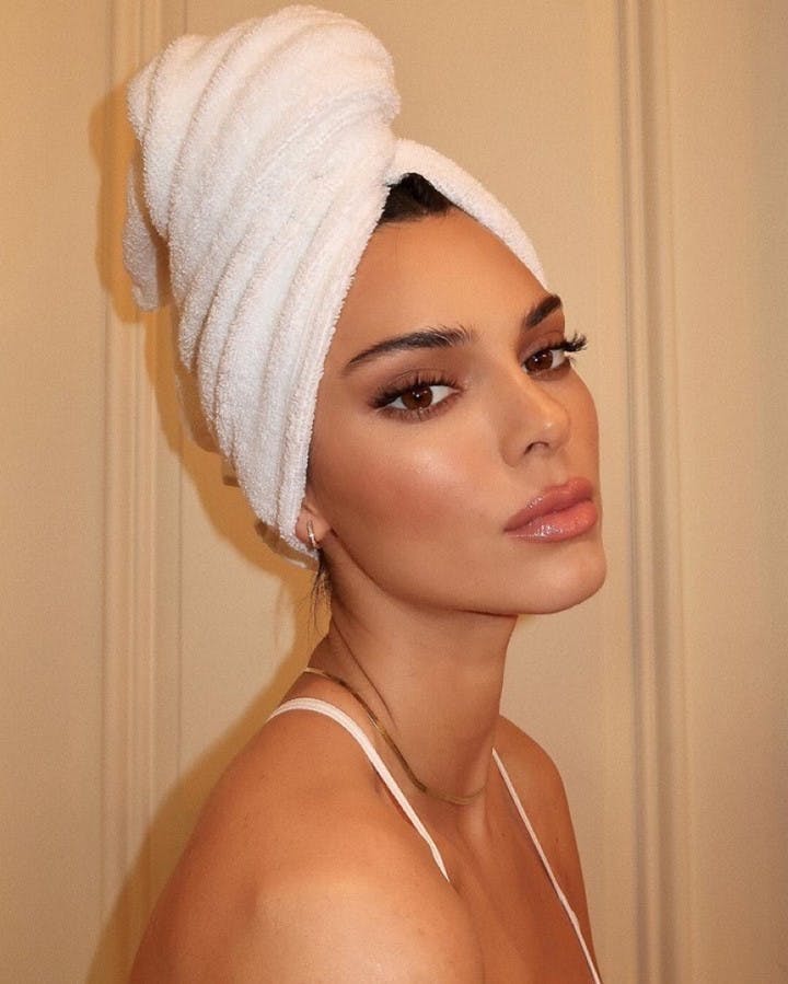 Kendall Jenner with a towel around her head
