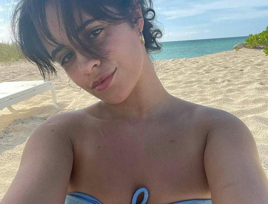 Camila Cabello in a blue bikini on the beach