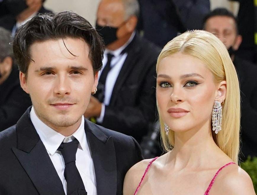 Close-up of Brooklyn Beckham and Nicola Peltz on the 2021 Met Gala red carpet.