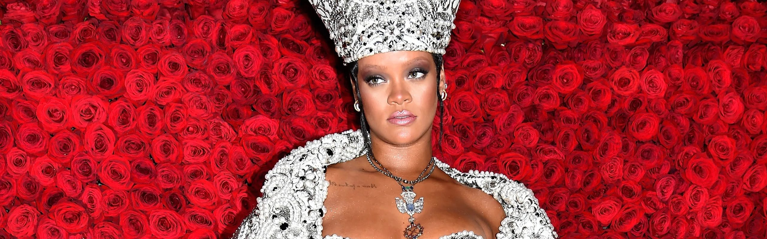 Rihanna wears dazziling Pope inspired gown to Met Gala