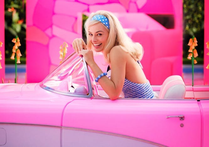 Margot Robbie as Barbie in hot pink car