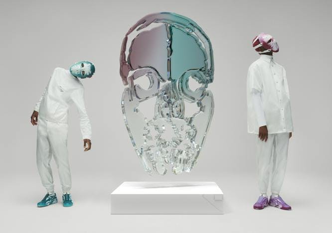 Two men in all white, blue and purple water skull, white background