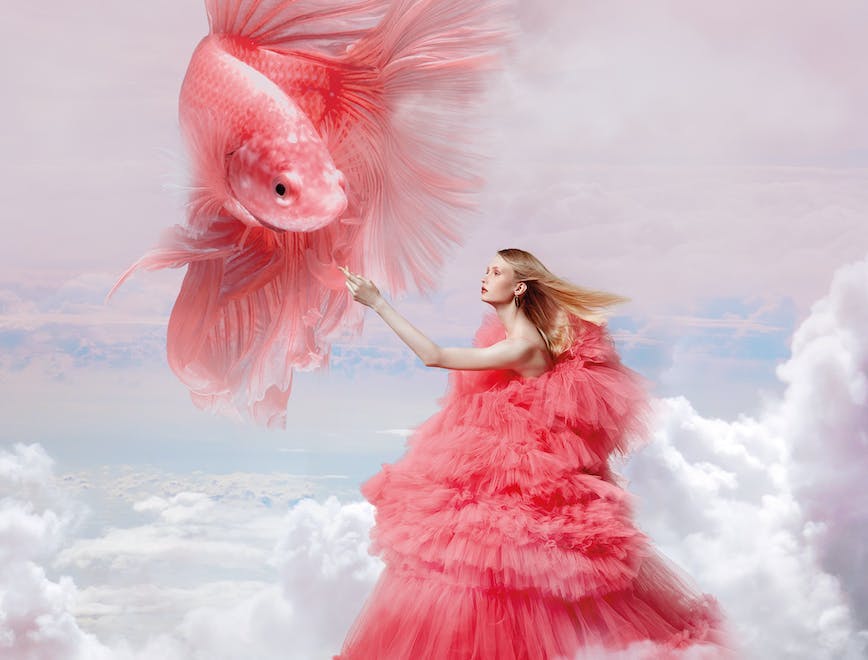 Photographed by Alessandro Esposito for L'OFFICIEL Art Spring 2022 surreal tulle fish clouds pink dress