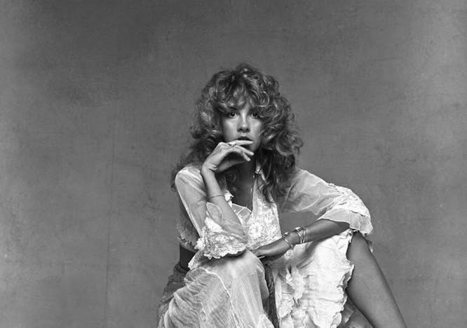 Stevie Nicks in White Gown and Heeled Clogs