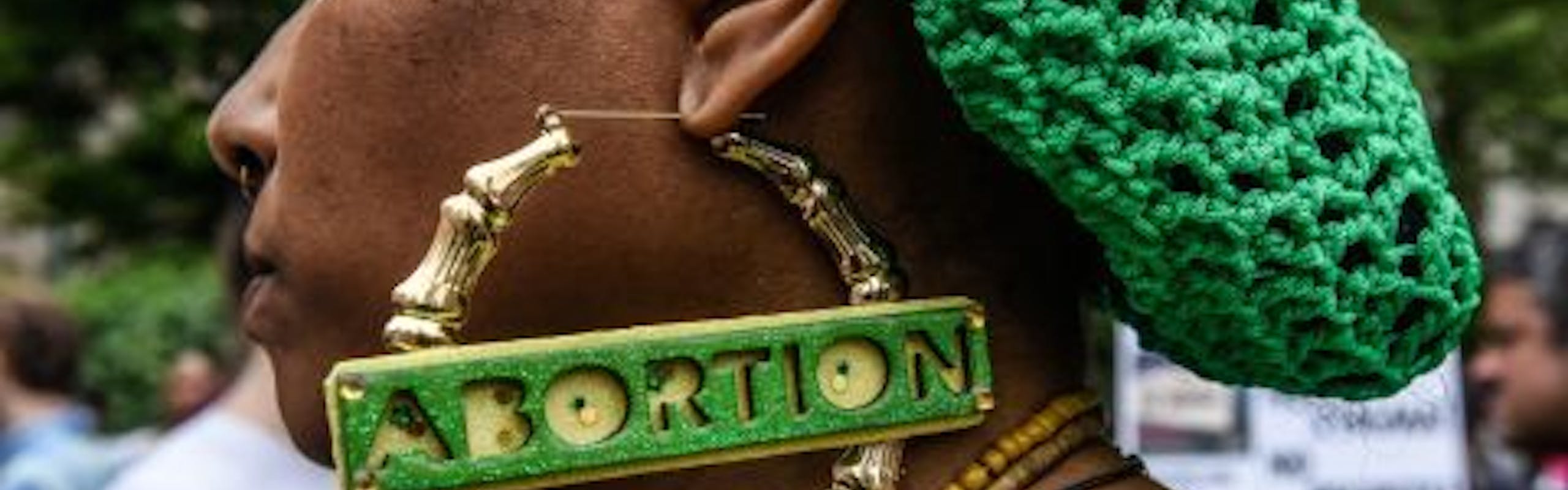 Earring that says abortion. 