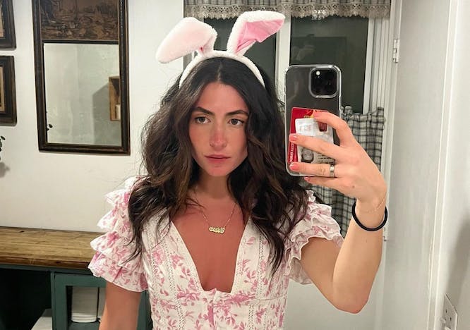 victoria paris in bunny ears and a pink and white dress