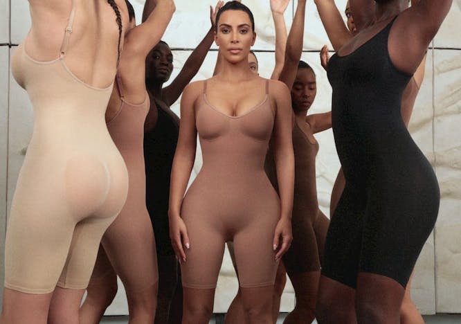 Kim Kardashian wearing brown SKIMS shapewear