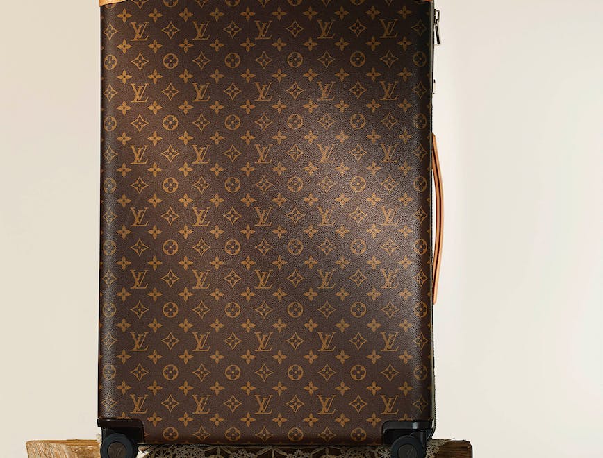 Brown suitcase on white background