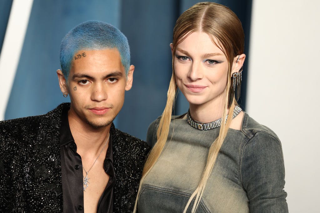 Dominic Fike and Hunter Schafer looking at the camera.