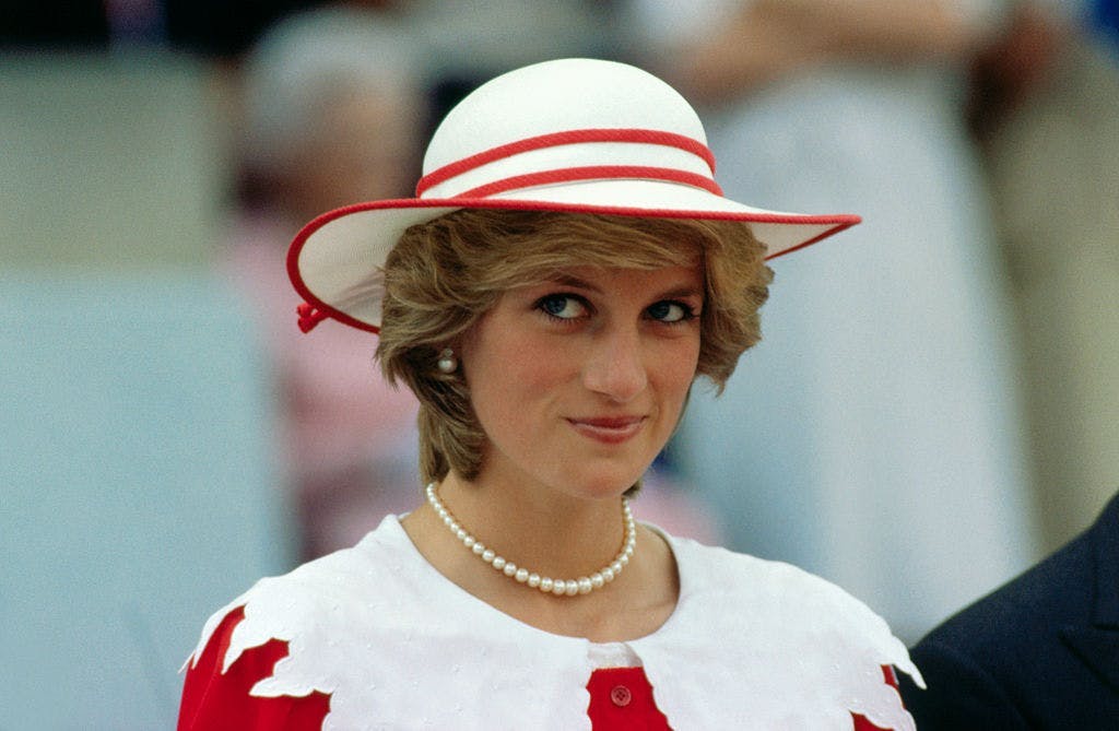 one person:cb1 smiling:cb2 head and shoulders:cb2 portrait:cb2 candid:cb2 beauty:cb1 hat:cb2 government:cb2 celebrities:cb2 princess:cb1 state visit:cb2 edmonton:cb2 princess diana:cb3 lady person hat clothing woman adult female face necklace jewelry