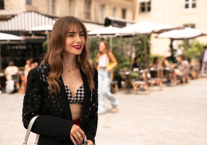 image of lily collins wearing bralette and jacket