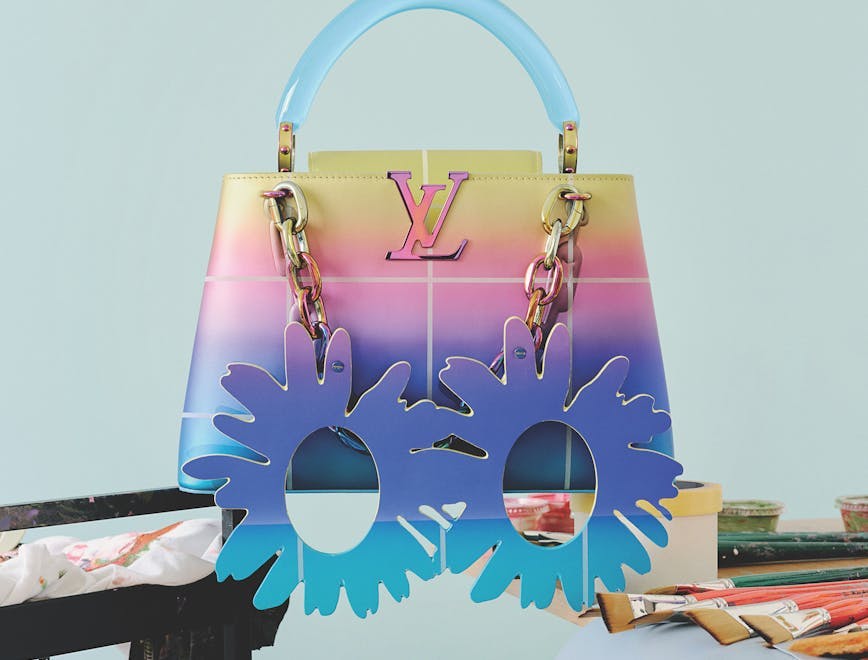 Rainbow-colored bag on a blue background