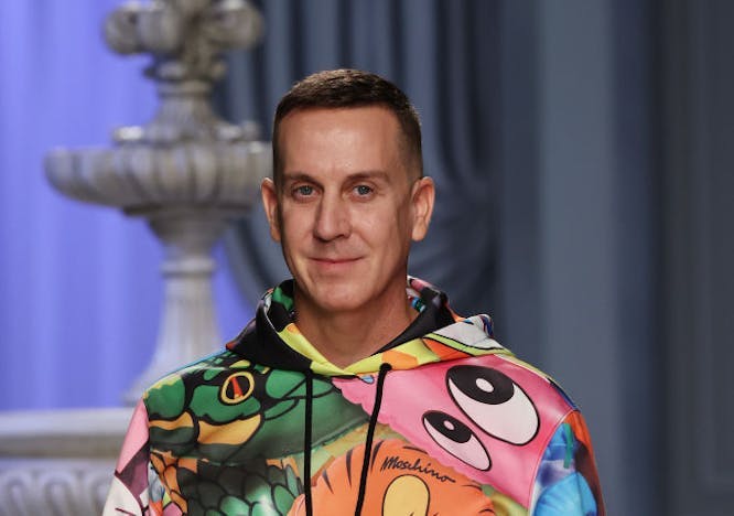 A man in a colorful hoodie.