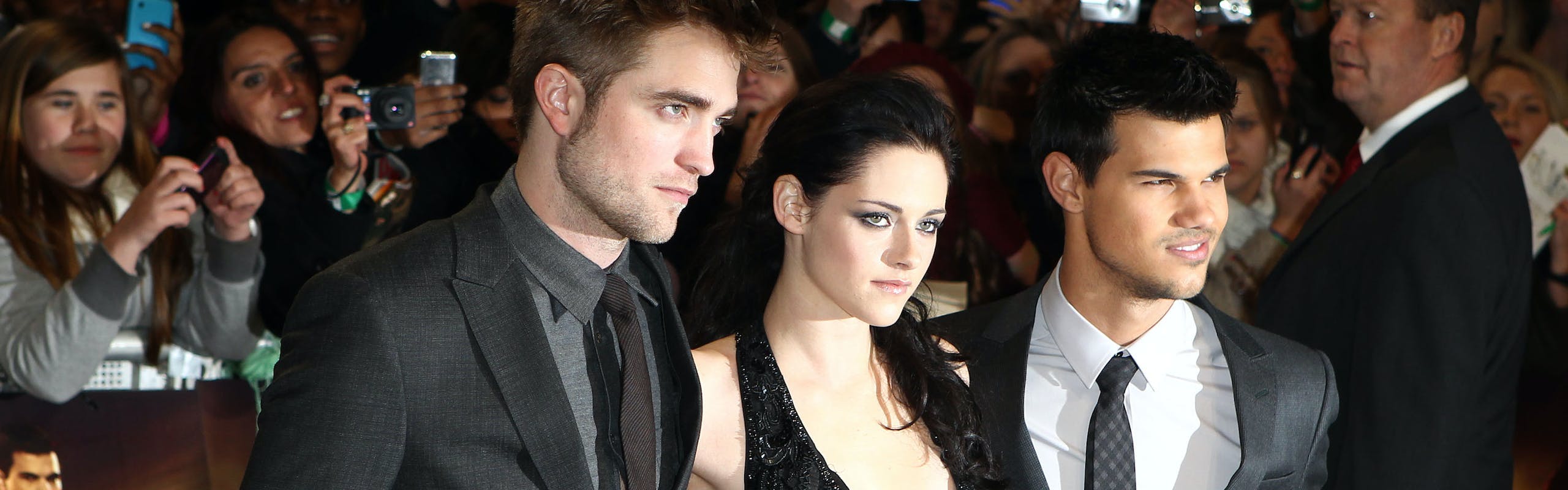 Robert Pattinson, Kirsten Stewart, and Taylor Lautner at the Twilight movie premiere.