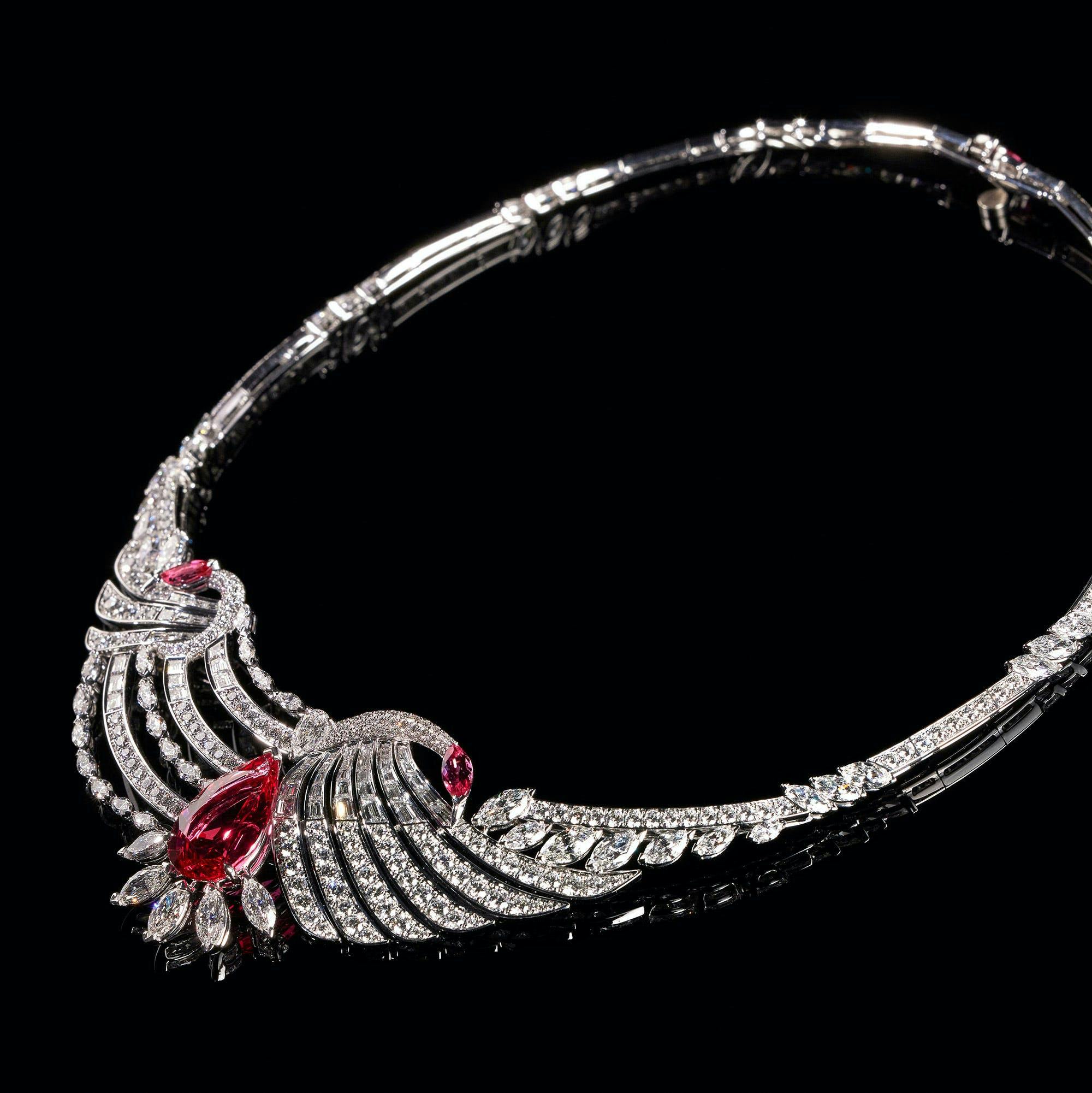 Piaget high jewelry necklace against black background.