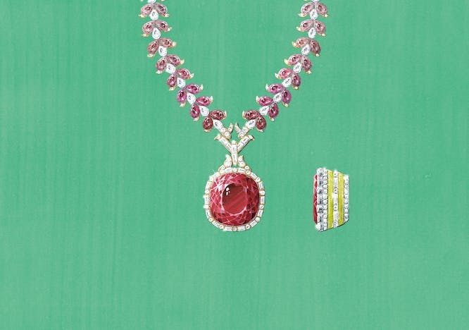 A ruby red Gucci necklace against a green backdrop.