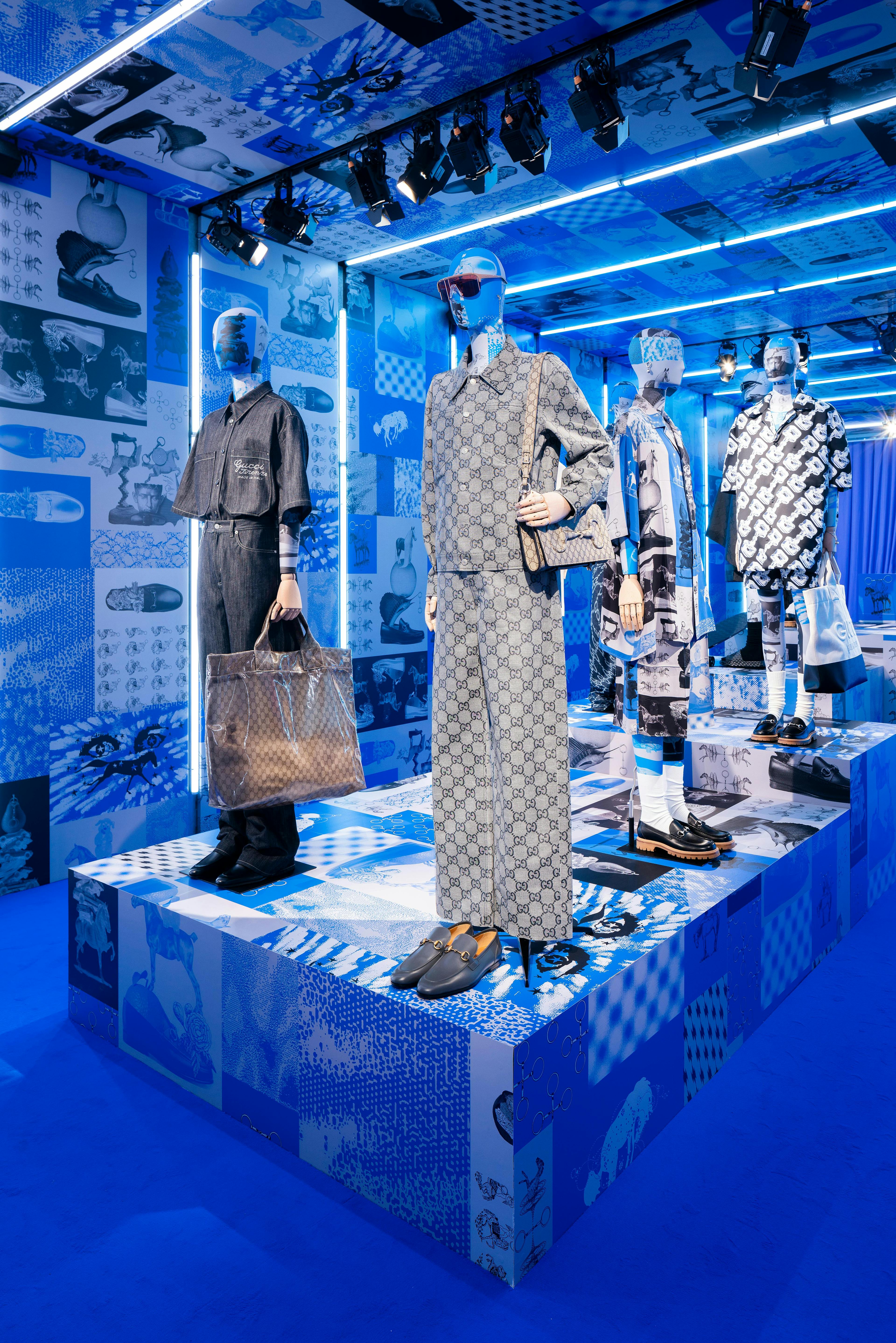 An exhibit with Gucci clothes.