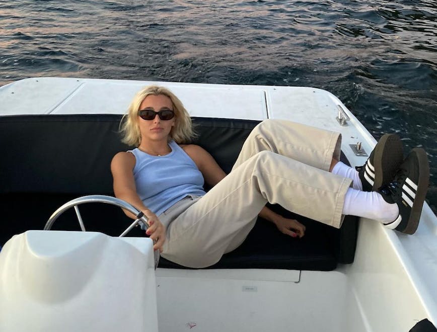 Emma Chamberlain on a boat