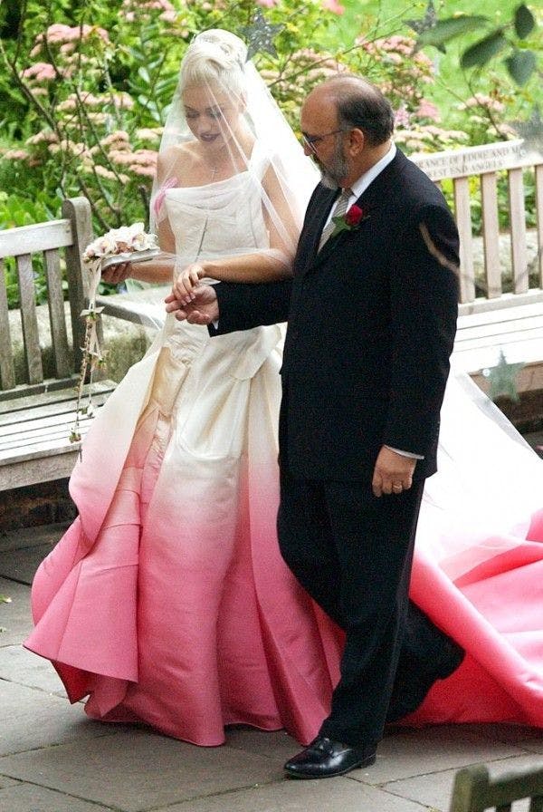 Gwen Stefani in a white and pink bridal dress.