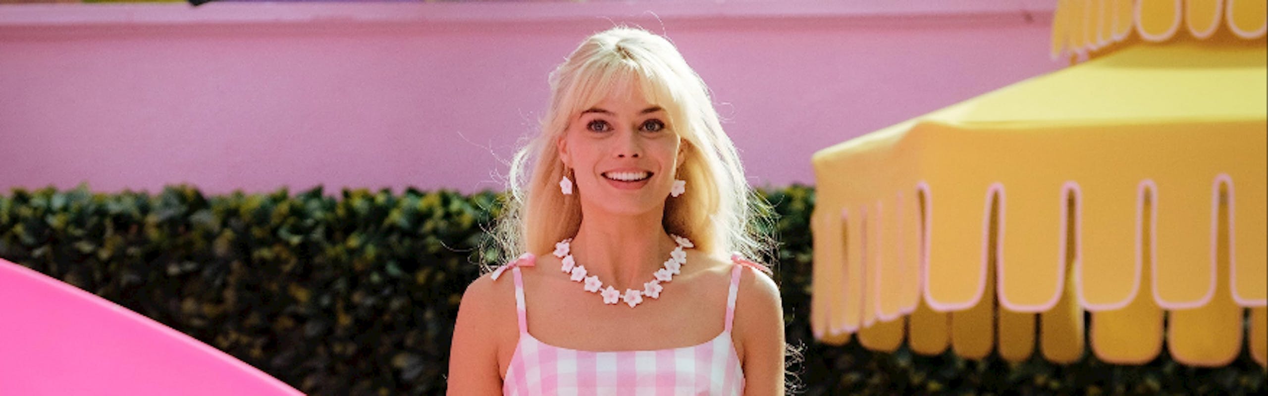 Margot Robbie in pink gingham dress Barbie movie outfits