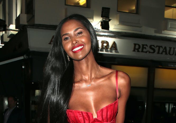 Young Ubah Hassan model photos; Ubah Hassan arriving at a club in London in a red dress in 2017.