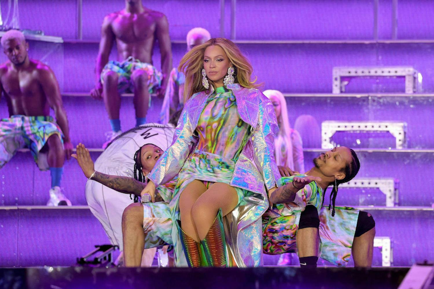 beyonce in sequin mini dress and cape concert couture