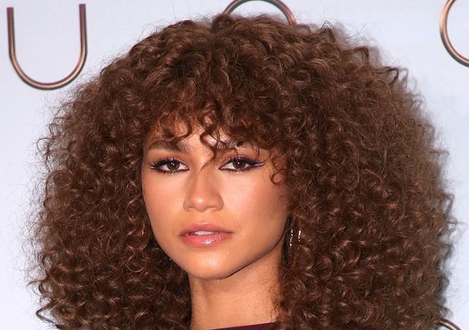 Zendaya in a red crop top; clarifying shampoo for curly hair