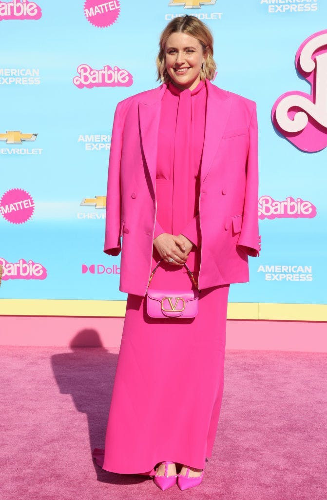 Greta Gerwig in a pink blazer and dress Barbie premiere Los Angeles red carpet